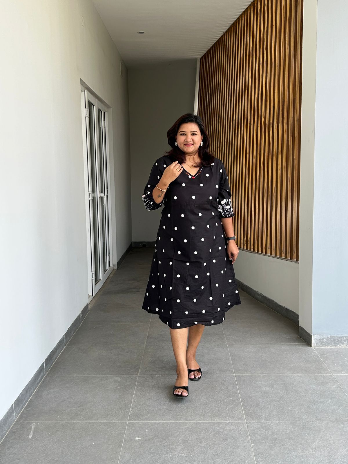 KUR196 - Black polka dress with embroidery in sleeves